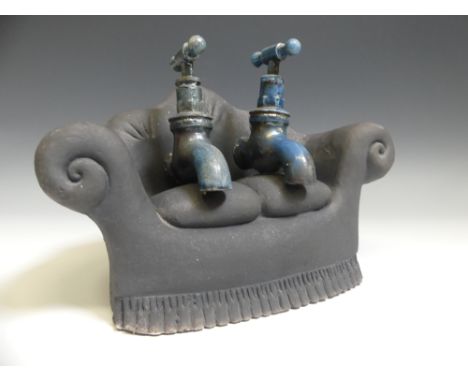 Lawson E. Rudge (b. 1936), a studio pottery sculpture of Taps on a Sofa, W 28cm x D 16cm x H 21cm.&nbsp;Provenance: from the 