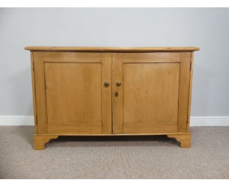 A vintage pine Dresser Base, with double cupboard doors opening to reveal a single shelf, on bracket feet, W 132cm x D 42cm x