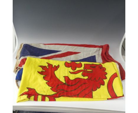 A vintage Scottish Lion Rampant Flag, printed cotton, yellow and red, 92in (234cm) x 46in (122cm), and an HM Coastguard Ensig
