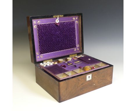 A Victorian mahognany and mother of pearl Sewing Box, the hinged lid opening to a fitted interior, with contents comprising m