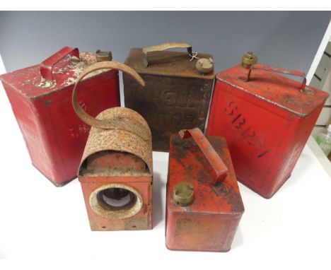 Four vintage petrol cans, including two BP cans marked SM &amp; BP Ltd, a Shell Motor Spirit can and a small can, together wi