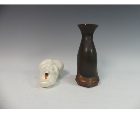 Lawson E. Rudge (b. 1936), a glazed studio pottery sculpture of a Swan, L 21cm, together with a black Stiletto Vase, small ch