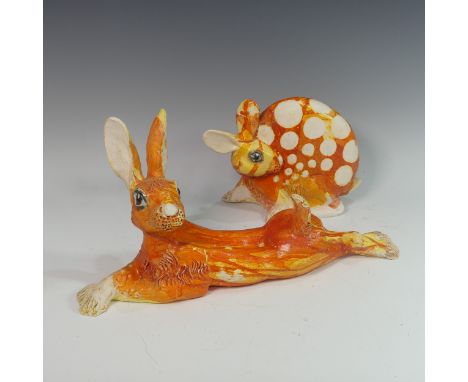 Lawson E. Rudge (b. 1936), a raku fired studio pottery sculpture of a flat Bunny, with orange decoration, H 20cm, together wi