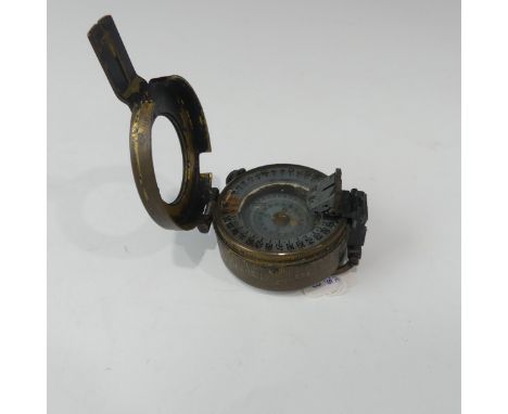 A WW2 Brass Military compass, dated 1942 MKII with serial no. B130403. 