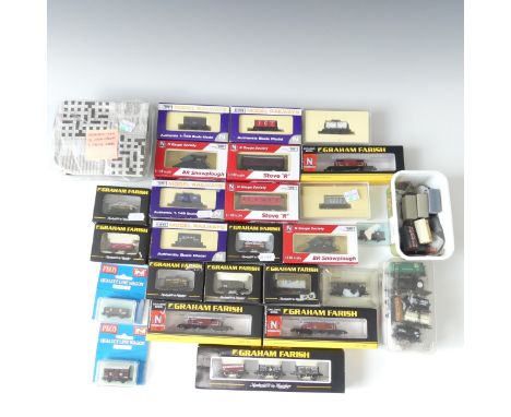 A collection of twenty-two N gauge model railway wagons and vans, by Graham Farish, Dapol and Peco, all boxed, together with 