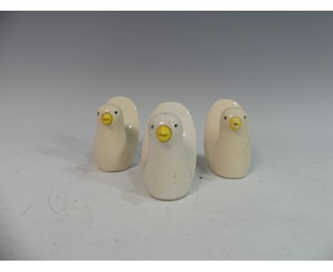 Lawson E. Rudge (b. 1936), a pair of glazed studio pottery Salt Pots, modelled as birds, H 8cm, together with another similar