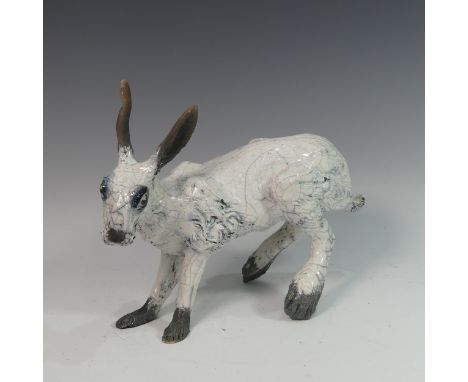 Lawson E. Rudge (b. 1936), a raku fired studio pottery sculpture of a Hare, L 36cm. Provenance: from the studio of Lawson Rud