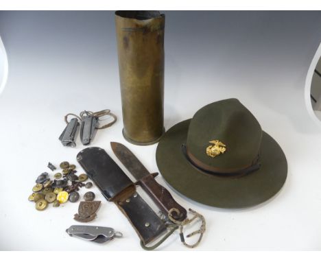 A quantity of Militaria, including a French Commando's Marine Hat Badge, marked on the reverse A.B. Paris, M. Chauvet 1943', 