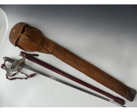 A George V Military officers sword, blade length 82cm together with scabbard outer leather case by Wilkins Pall Mall London, 