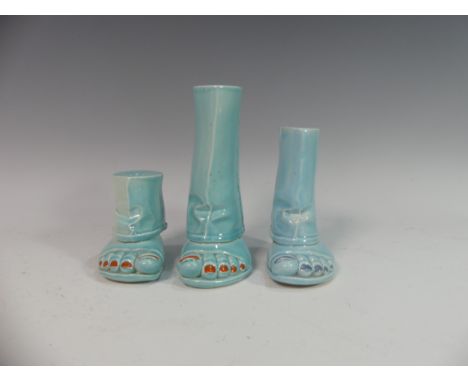 Lawson E. Rudge (b. 1936), a pair of blue glazed studio pottery Salt and Pepper Pots, modelled as feet with painted toenails,