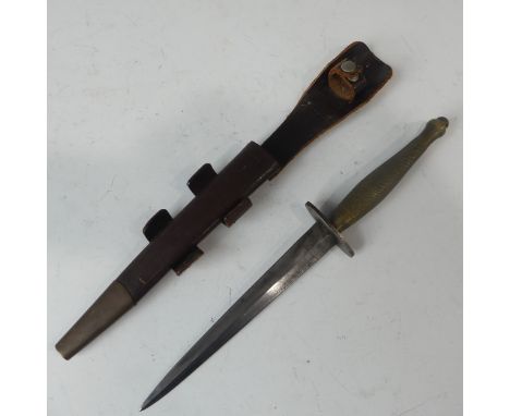 A WW2 period Fairbairn Sykes Commando Fighting Knife, 2nd pattern, the double edged spear point blade marked for Wilkinson Sw