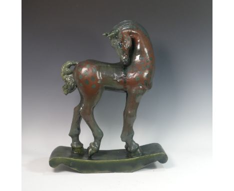 Lawson E. Rudge (b. 1936), a raku studio pottery sculpture of a Tang Horse, H 60cm. Provenance: from the studio of Lawson Rud