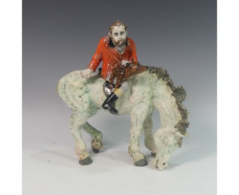 Lawson E. Rudge (b. 1936), a raku fired studio pottery sculpture of a Grazing Horse, with self portrait of the artist with a 