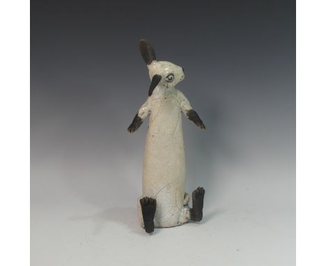 Lawson E. Rudge (b. 1936), a raku fired studio pottery sculpture of a Hare, modelled sitting upright, H 42cm. Provenance: fro