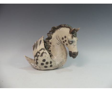 Lawson E. Rudge (b. 1936), a raku fired studio pottery sculpture of a Horse, modelled as half horse and half swan, H 24cm. Pr