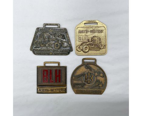 Metal finish with embossed design and lettering. First fob front side: BLH Austin-Western, Graders-Rollers, Sweepers-Cranes; 