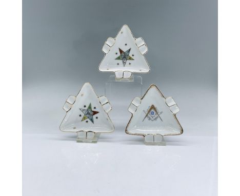 Three white triangular shaped ashtrays with masonic symbols. Two have the Masonic Order of the Eastern Star. One has a capita