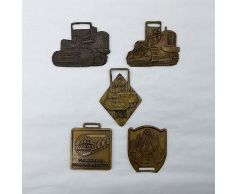 Metal finish with embossed design and lettering. First and second fob front side: an emboss image of an Allis Chalmers tracto