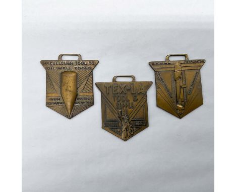 Metal finish with embossed design and lettering. First fob front view: McCullough Tool Co. Oil Well Tools, Gun Perforators, H
