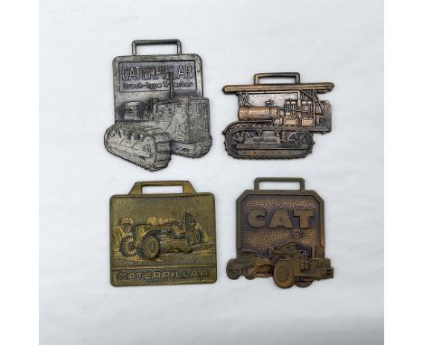 Metal finish with embossed design and lettering. First fob front view: Caterpillar Track-Type Tractor; reverse side: Tractors