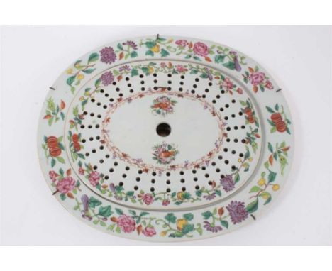 A Chinese famille rose export porcelain platter and strainer, decorated with flowers and fruit, 36.5cm x 31cmTwo chips on the