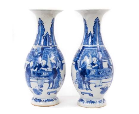 A pair of 19th century Chinese blue and white porcelain vases, of baluster form, each painted with a figural scene, with foli