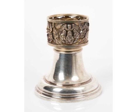 Base of an 'Aurum' Limited Edition contemporary silver candle lamp, with decorative cast and pierced candle holder, on a pede