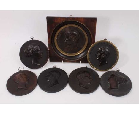 Seven 19th century Bois Durci portrait roundel plaques, subjects including Queen Victoria, 11cm diameter, also Prince Albert,