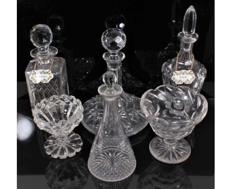 A group of antique cut glassware, including four decanters of various form (two with Halcyon Days enamel labels), and two foo
