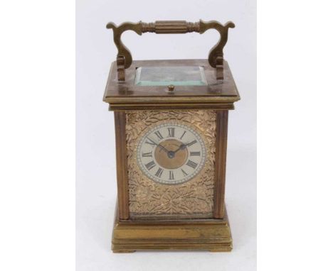 Late 19th century French brass carriage clock with floral pierced front plate and silvered dial signed Mackay &amp; Chisholm,