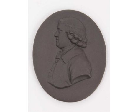 A basalt pottery portrait medallion of Josiah Wedgwood, probably 19th century, 9cm x 7cmIn good condition with no damage. 
