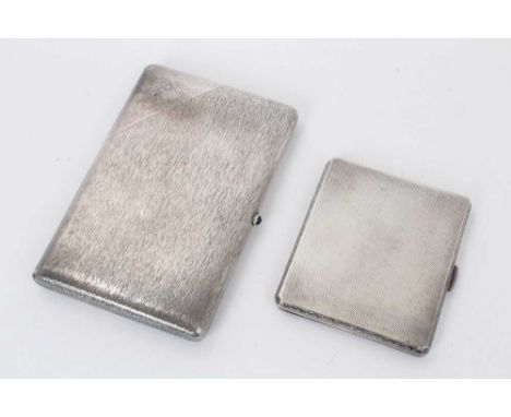 Early 20th century German silver cigarette case of rectangular form, with bark effect decoration and engraved armorial shield