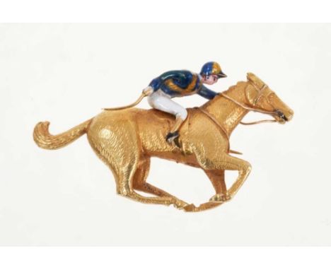 Good quality gold and enamel horse and jockey brooch in the colours of Sir Noel and Lady Murless, 38mm.Good condition. The en