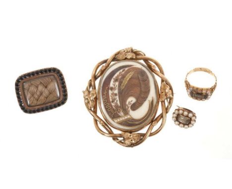 Collection of 19th century mourning jewellery to include a Georgian hairwork brooch with glazed compartment, garnet border an