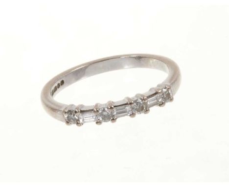 Diamond eternity ring with a half hoop of brilliant cut and baguette cut diamonds in 18ct white gold setting, Birmingham 2006