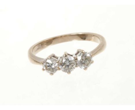 Diamond three stone ring with three brilliant cut diamonds, estimated to weigh 1ct in total, in claw setting on 18ct white go