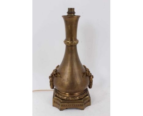 Antique French bronze lamp base, of baluster form with engine turned finish and laurel swags on shaped square base, 39cm high