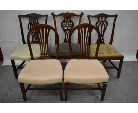 George III style carved mahogany dining chair in the manner of Chippendale by Waring and Gillows, with brass label to seat ra