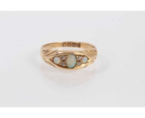 Late Victorian 18ct gold opal and diamond ring with three opal cabochons and four old cut diamonds in 18ct gold setting, Birm