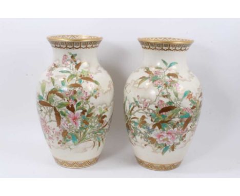 A pair of impressive late 19th century Japanese Satsuma earthenware vases, decorated with flowers in enamels and gilt, patter