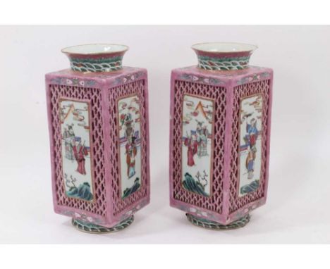 A pair of 19th century Chinese famille rose porcelain lanterns, of square form with round neck and foot, painted with panels 