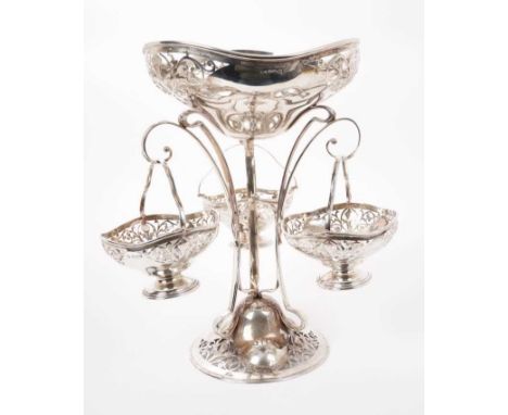 Early George V silver épergne of shaped form, with pierced decoration, raised on three scroll legs and a domed circular pierc