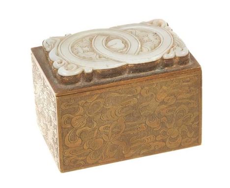 Chinese jade mounted engraved brass box, the hinged cover inset with shaped pierced plaque with entwined dragon, engraved to 