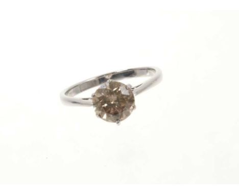 Diamond single stone ring with a round brilliant cut diamond of pale cinnamon colour, estimated to weigh approximately 1.85ct