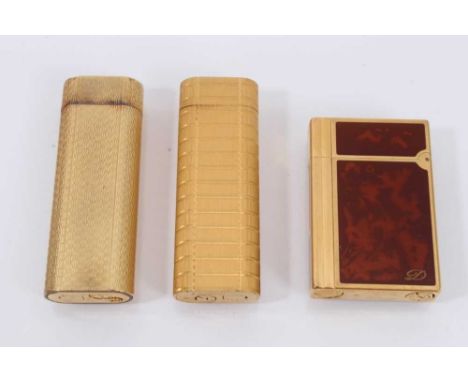 Two vintage Cartier gold plated lighters with engine turned decoration and a Dupont lighter (3)