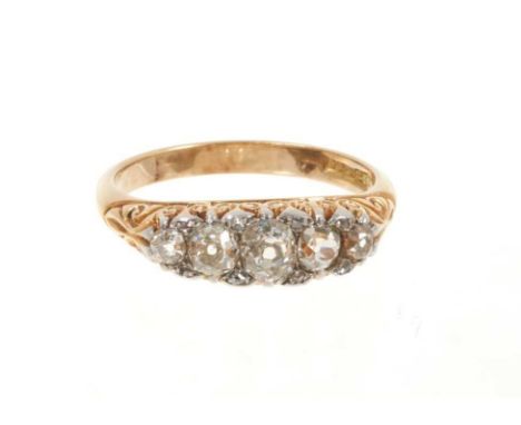 Late Victorian diamond five stone ring with five graduated old cut diamonds in carved gold setting on plain gold shank, estim