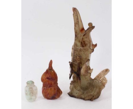 Chinese russet jade carving of a pike in waves, 20cm high, together with carved jade snuff bottle and stopper and a carving o