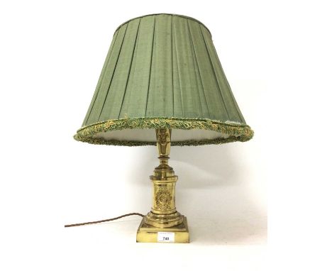 Classical revival brass lamp, in the form of a slender twin handled urn, raised on circular column and square stepped base, a