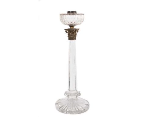 Impressive antique glass lamp column, with facetted reservoir raised on Corinthian capital and facetted column on spread foot