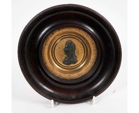 19th century ormolu medallion depicting William Pitt, in period glazed fruitwood frame, 17cm diameter, together with an embos